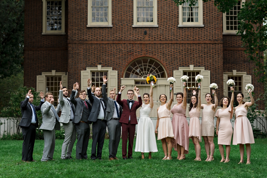 A wedding party cheers in front of carpenters hall in Philadelphia.
